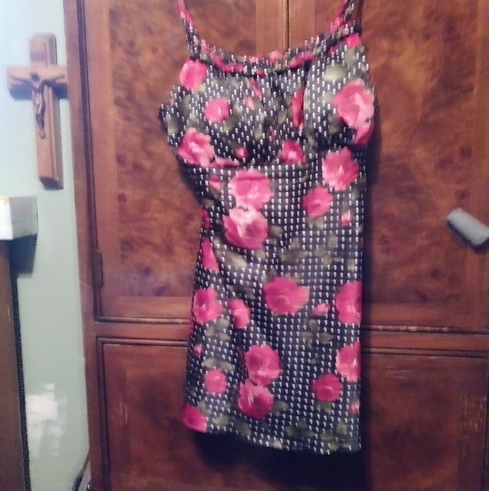 A black with white dots and red roses tank top.